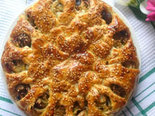 Tourte aux champignons de Paris rosés, oignons et jambon italien