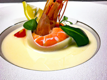 Papillote de langoustine sur sa petite bisque