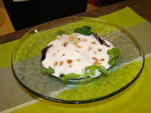 Raviole d'agneau presto sous une couverture de lard et de noisettes