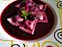 Raviolis à la farce papillonnante  au jus de cerise