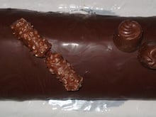 Bûche biscuit amande au sirop de clémentines mousse de marrons nappage chocolat noir