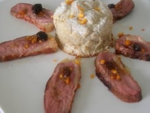 Soufflé de pommes de terre à la châtaigne, canard à la mandarine et aux raisins