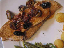 Rôti de veau aux olives et lardons fumés