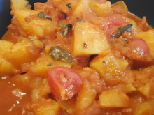 Curry de pommes de terre aux tomates