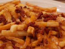 Poutine revisitée pour les français