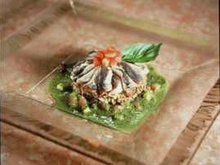 La tarte aux sardines et riz rouge de Camargue, huile de basilic