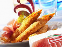 Crevettes en chemise de jambon cru, panées et frites