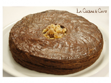 Galette feuilletée chocolat, garniture amande parfumée cognac et brisures de marrons glacés