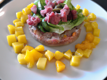 Tartare de canard, mangues et sardines marinées