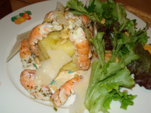 Langoustines marinées aux herbes et écrasée de pomme de terre parfumée à la truffe