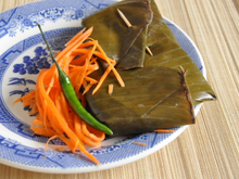 Filet de poisson en papillotes de feuilles de bananier