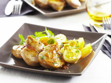 Filet mignon de porc caramélisé à l'arôme, courgettes confites et zestes d'orange