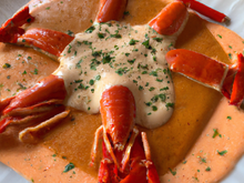 Ravioles de langoustines et leur crème crustacés au paprika fumé