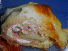 Roulés d'aubergine à la ricotta, gratinés à la mozzarella