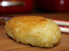 Croquettes de Risotto au parmesan, pesto au basilic et cœur fondant au comté.
