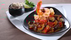Tajine de légumes grillés et gambas royales au grill