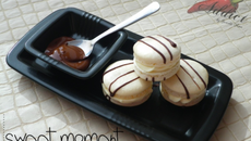 Macarons au chocolat blanc, décorés de chocolat noir