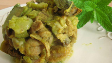 Tajine d'agneau aux artichauts violets, fèves et courgettes à la menthe