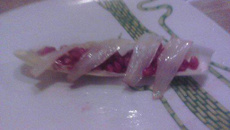 Endive à la grenade sur lit de surimi
