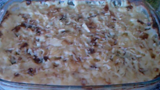 Gratin de pommes de terre avec escalope et champignon