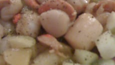 Saint Jacques à la mangue et aux fruits de mer