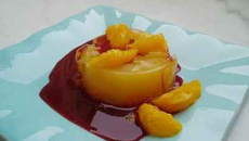 Aspics à l'orange et coulis de framboises