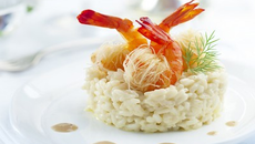 Risotto acidulé, crevettes croustillantes et crème d'étrilles