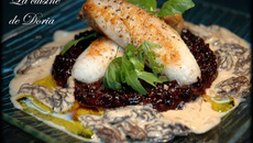 Risotto de riz Venere accompagné de sa lotte et sa sauce aux morilles