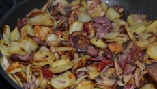 Poêlée de pommes de terre, gésiers, champignons