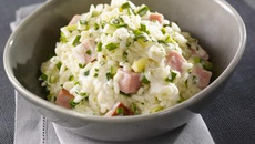 Risotto aux dés de rôti de porc braisés, courgettes et parmesan