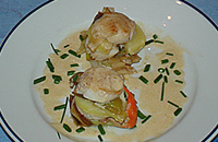 Millefeuille de pomme de terre aux poireaux et St Jacques