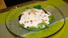 Raviole d'agneau presto sous une couverture de lard et de noisettes