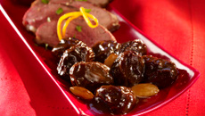 Magret de canard au miel et pruneaux aux amandes