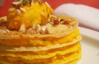 Millefeuille de crêpes de pois chiches au cumin & mousse de carotte à la coriandre