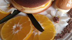 Biscuit au confit d'orange, crème brûlée vanille, suprême de chocolat