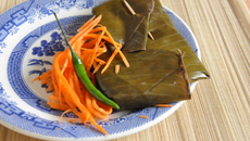 Filet de poisson en papillotes de feuilles de bananier