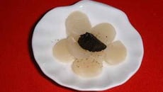 Noix de pétoncles aux épluchures de truffe