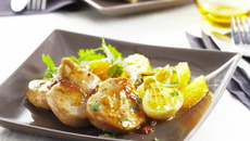 Filet mignon de porc caramélisé à l'arôme, courgettes confites et zestes d'orange