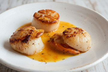Saint jacques poêlées sauce à l'orange