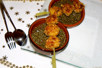 Lentilles tièdes au vinaigre de framboise et sa brochette de boudin blanc panée au pignon