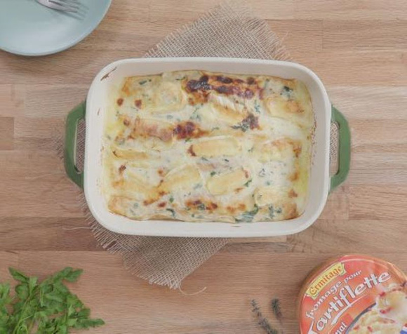 Gratin de crêpes au fromage à raclette. Ermitage