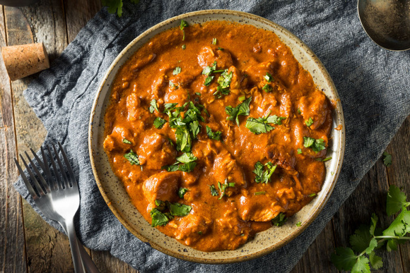 Poulet curry et coco. Adobestock