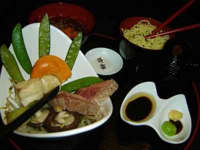 Magrets de canard et Saint Jacques en bouillon de légumes au miso