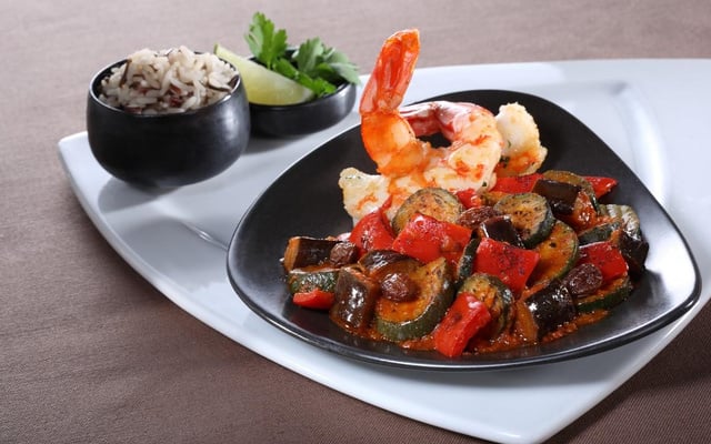 Tajine de légumes grillés et gambas royales au grill