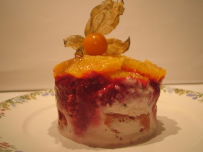 Fantaisie à l'orange avec son coulis de framboises