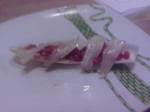 Endive à la grenade sur lit de surimi