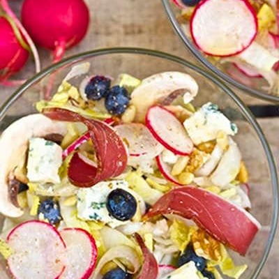 Salade d'endives, magret séché et vinaigrette mandarine