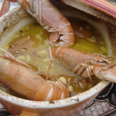 Tajine de joues de lotte aux abricots et langoustines