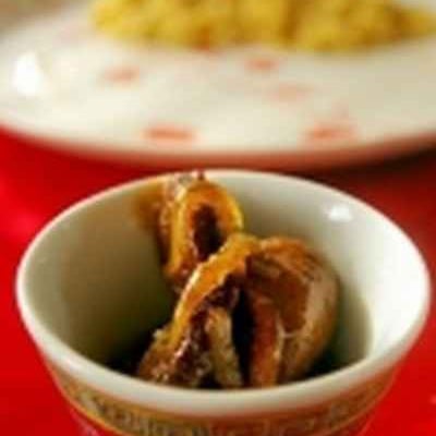 Wok de magret de canard aux oignons et au miel