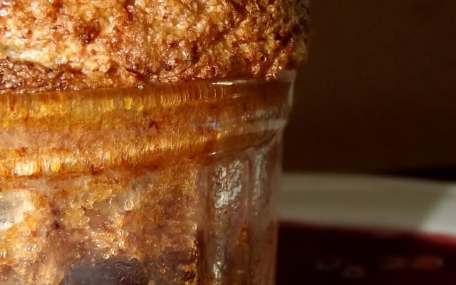 Soufflé de Persimon et coulis de framboise poivrée